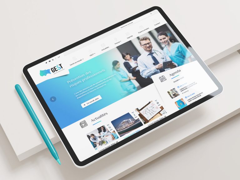 Association GEST Site web affiché sur un grand écran dans un bureau