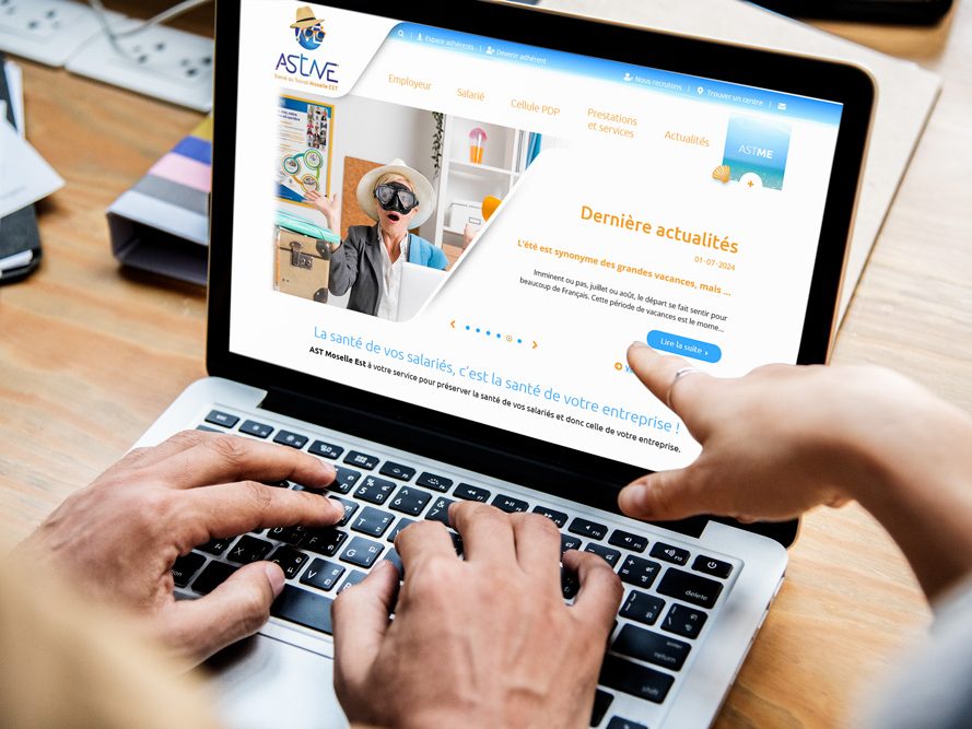 Site web de l'ASTME affiché sur un ordinateur portable